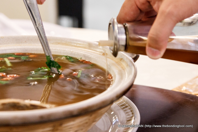 Turtle Soup. Pour some herb infused wine into the claypot of turtle soup to ehnace the soup's flavour as well as to promote blood circulation.